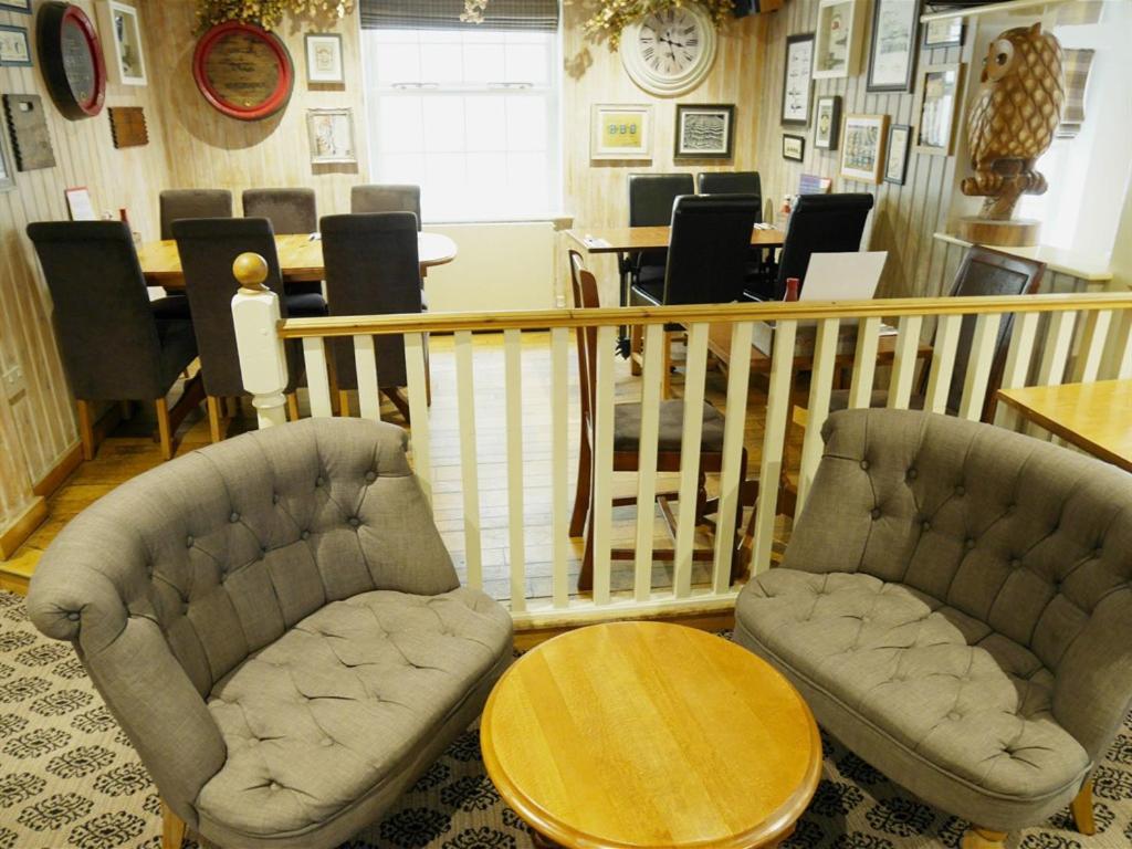 Inn The Tawny Owl